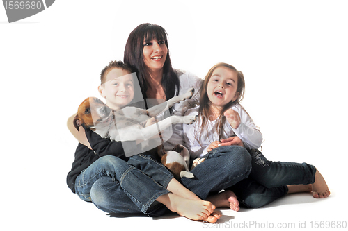 Image of family and  jack russel terrier