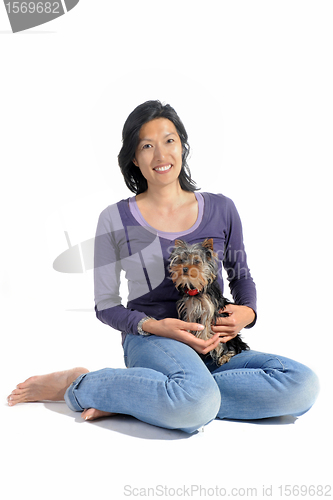 Image of yorkshire terrier and asian girl