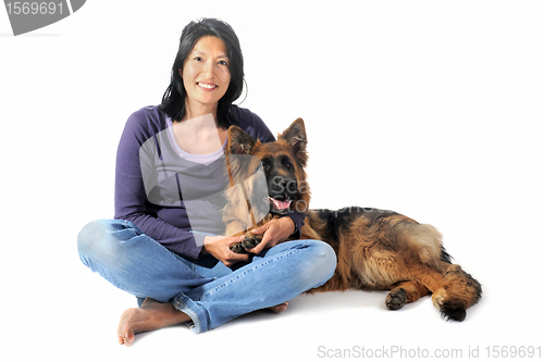 Image of german shepherd and chinese girl