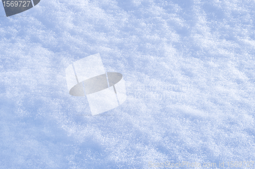 Image of Detail of snow texture with shadows - background