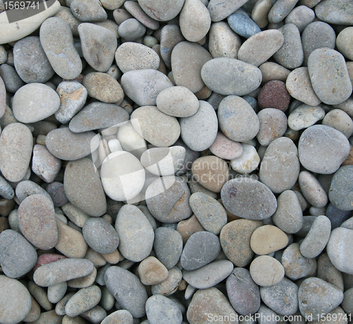 Image of Grey pebbles on the beach as background 