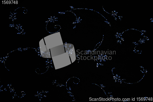 Image of Elegant blue flowers on black fabric 