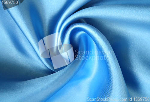 Image of Smooth elegant blue silk as background