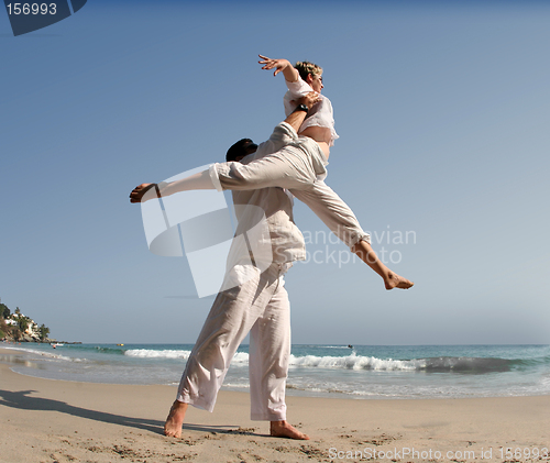 Image of Young couple on the beach