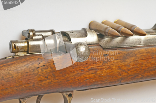 Image of carbine with ammunition