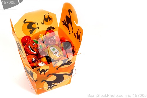 Image of Halloween candy in orange chinese container