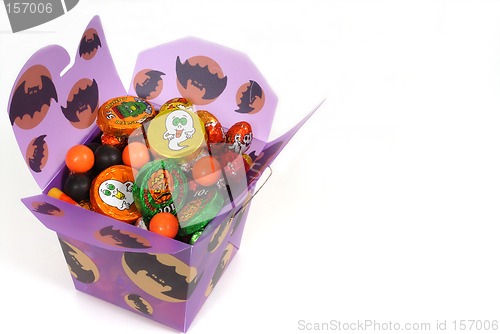 Image of Halloween candy in purple chinese container