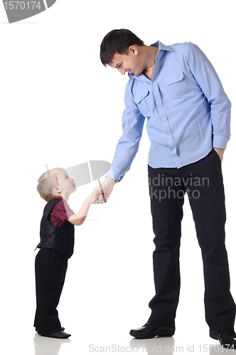 Image of Handshake of a man and boy