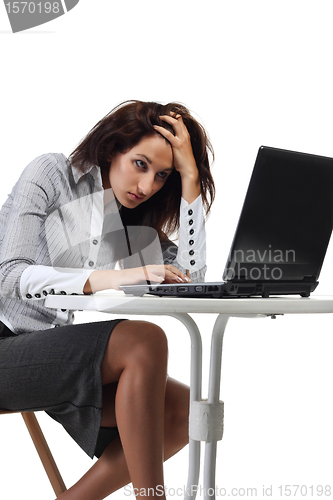 Image of Tired women sitting with computer