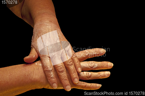 Image of hands with creme