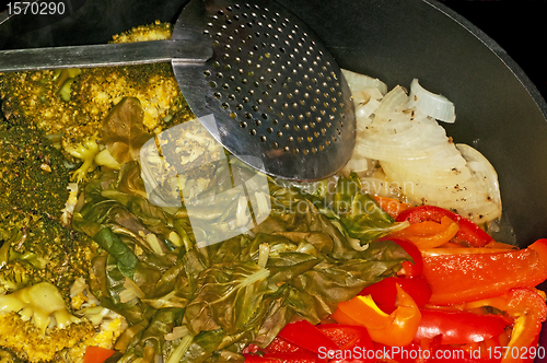 Image of pan with steamed  vegetables