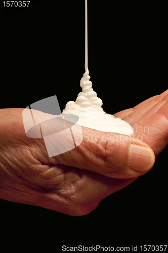 Image of hand with bodylotion