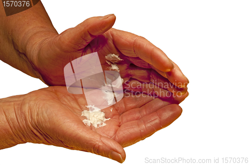 Image of hands with creme