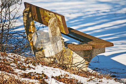 Image of park bench in winter