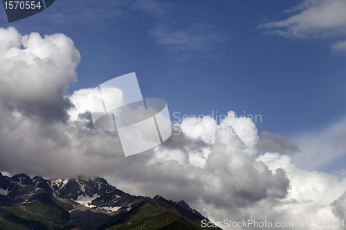 Image of Mountains and blue sky with clouds