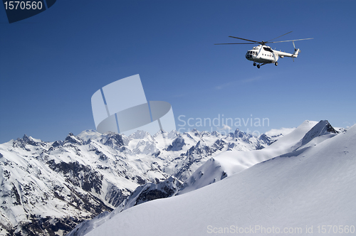 Image of Helicopter in snowy mountains