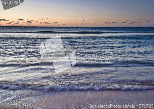 Image of peaceful beach sunrise