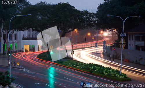 Image of car road lights at sunset