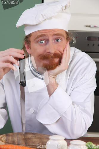Image of Young chef thinking for prepare lunch