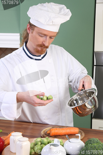 Image of Young Chef with Brussels sprouts