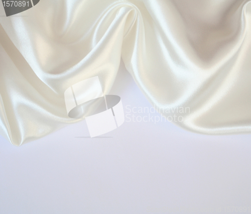 Image of Smooth elegant white silk as background 
