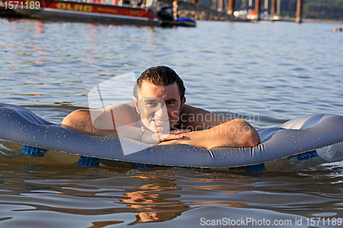 Image of man in lake