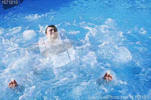 Image of bathing in jacuzzi of spa center