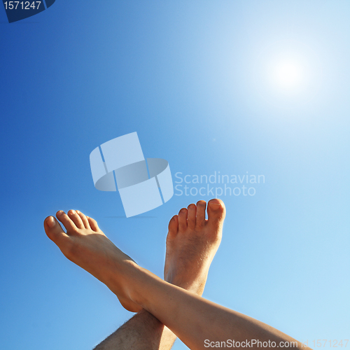 Image of feet and sun