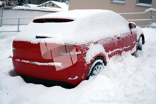 Image of red car covered 