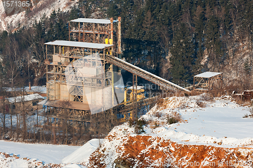 Image of Stone quarry with silos, conveyor belts in winter