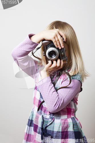 Image of Little girl with camera