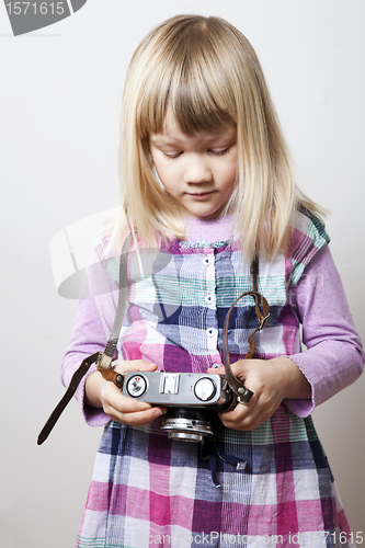 Image of Little girl with camera