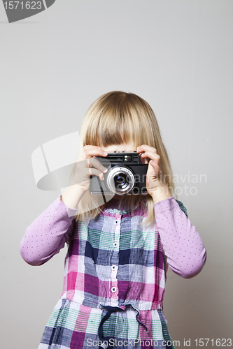 Image of Little girl with camera