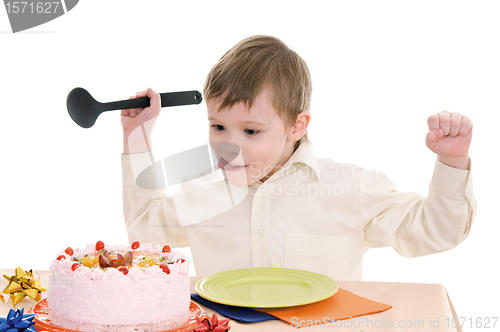 Image of boy with cake