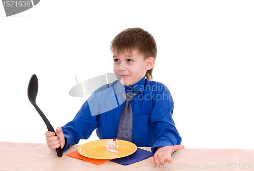 Image of boy with a big spoon