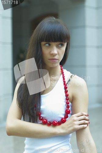 Image of Girl with red beads