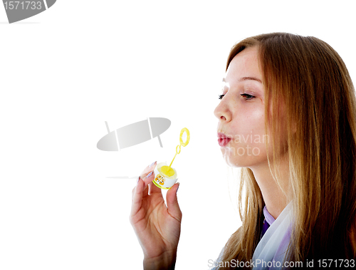 Image of Attractive girl with soap bubbles
