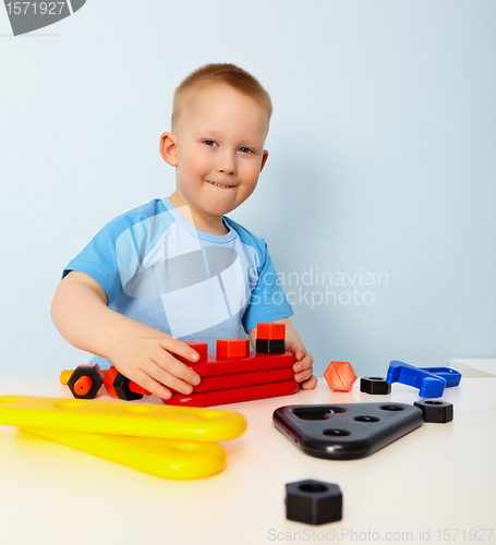 Image of Little boy playing