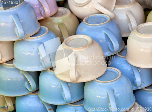 Image of Old-fashioned ceramic chamber pots on the market