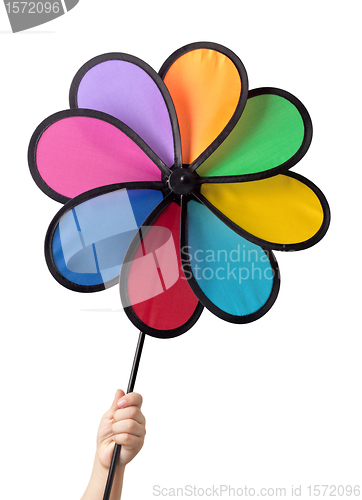 Image of Child hand holding a pinwheel