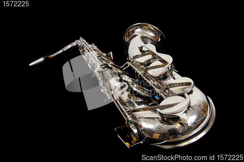 Image of silver saxophone isolated on the black background