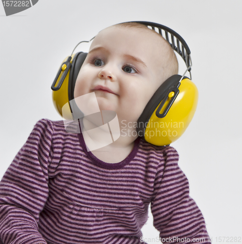 Image of baby with ear protection