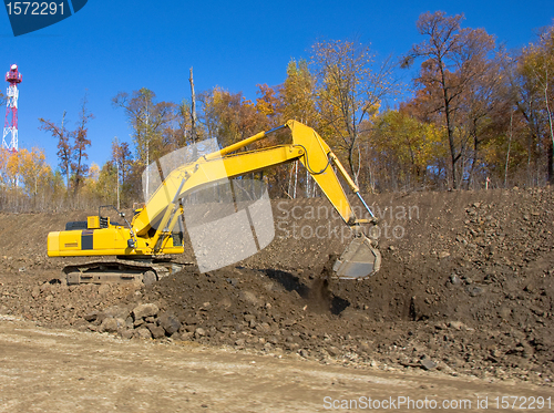 Image of Yellow backhoe