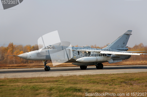 Image of Military jet bomber airplane Su-24 Fencer 