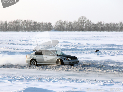 Image of Car on winter road.