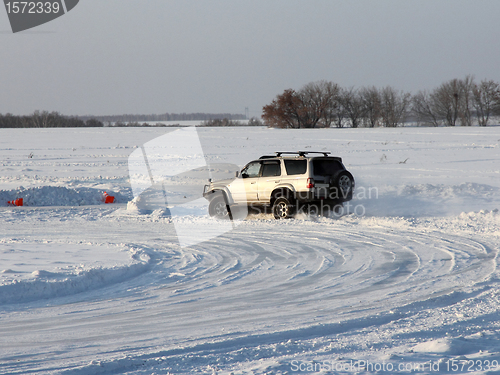 Image of Car on winter road.