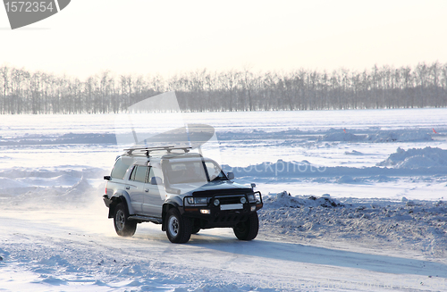 Image of Car on winter road.