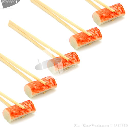 Image of sushi on chopstick