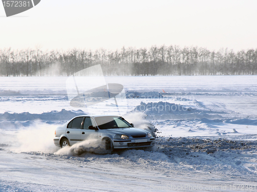 Image of Car on winter road.