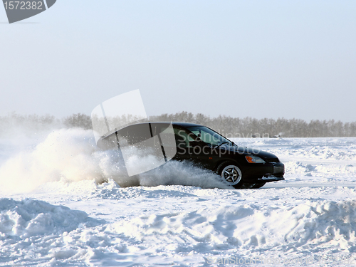 Image of Car on winter road.